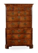 A GEORGE II WALNUT AND FEATHER BANDED CHEST ON CHEST, CIRCA 1730