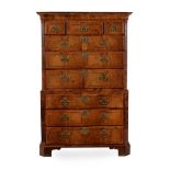 A GEORGE II WALNUT AND FEATHER BANDED CHEST ON CHEST, CIRCA 1730