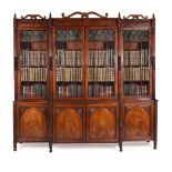 Y A GEORGE IV MAHOGANY AND SIMULATED ROSEWOOD BREAKFRONT LIBRARY BOOKCASE, CIRCA 1825