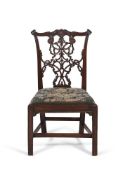 AN EARLY GEORGE III MAHOGANY SIDE CHAIR IN THE MANNER OF THOMAS CHIPPENDALE, CIRCA 1760