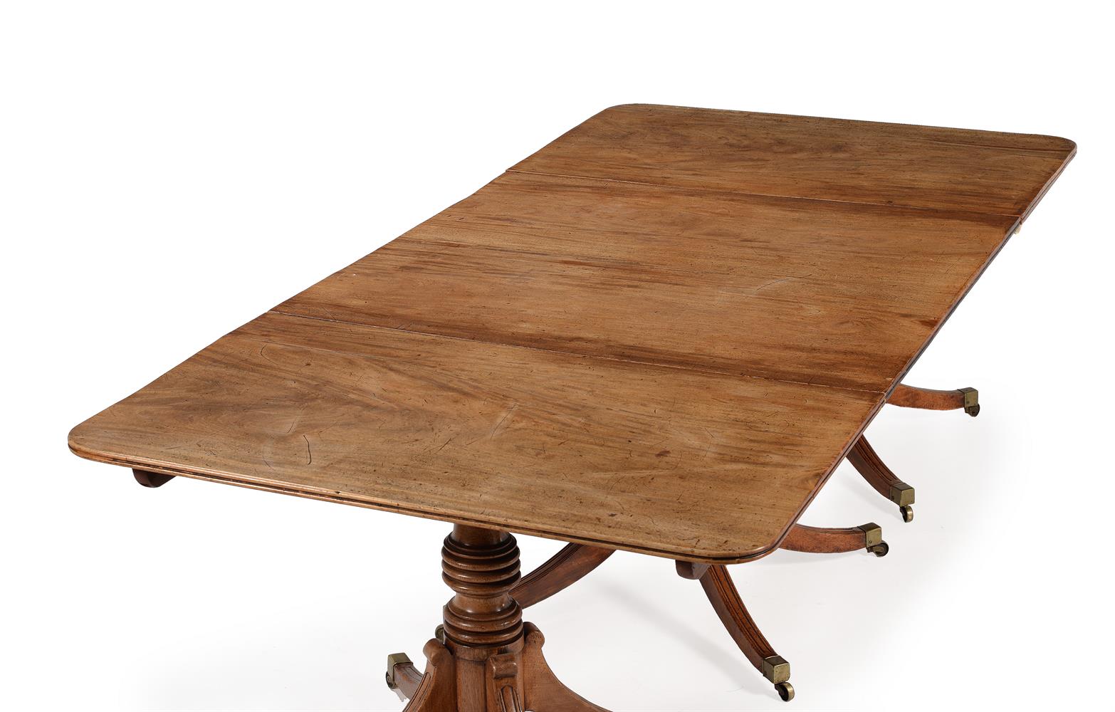 A MAHOGANY TRIPLE PILLAR DINING TABLE, EARLY 19TH CENTURY AND LATER - Image 2 of 3