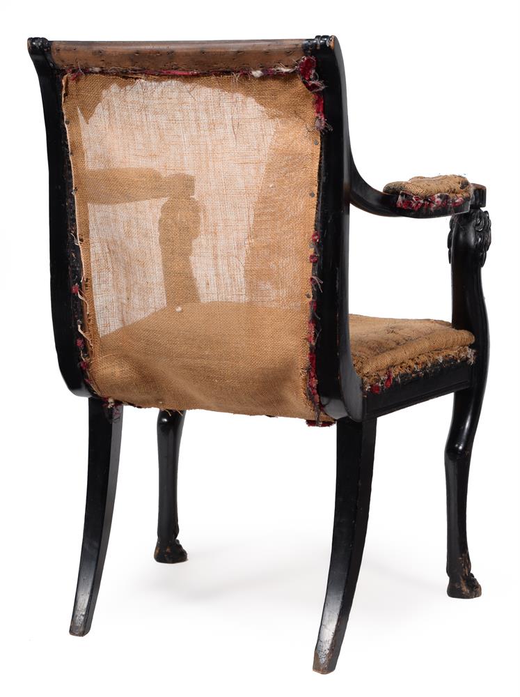 A LATE GEORGE III EBONISED OPEN ARMCHAIR, IN THE MANNER OF THOMAS HOPE, CIRCA 1810 - Image 4 of 4