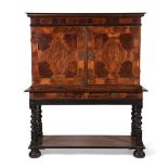 AN ANGLO-DUTCH OR FLEMISH BURR WALNUT, WALNUT, OAK AND EBONISED CABINET ON STAND, CIRCA 1690