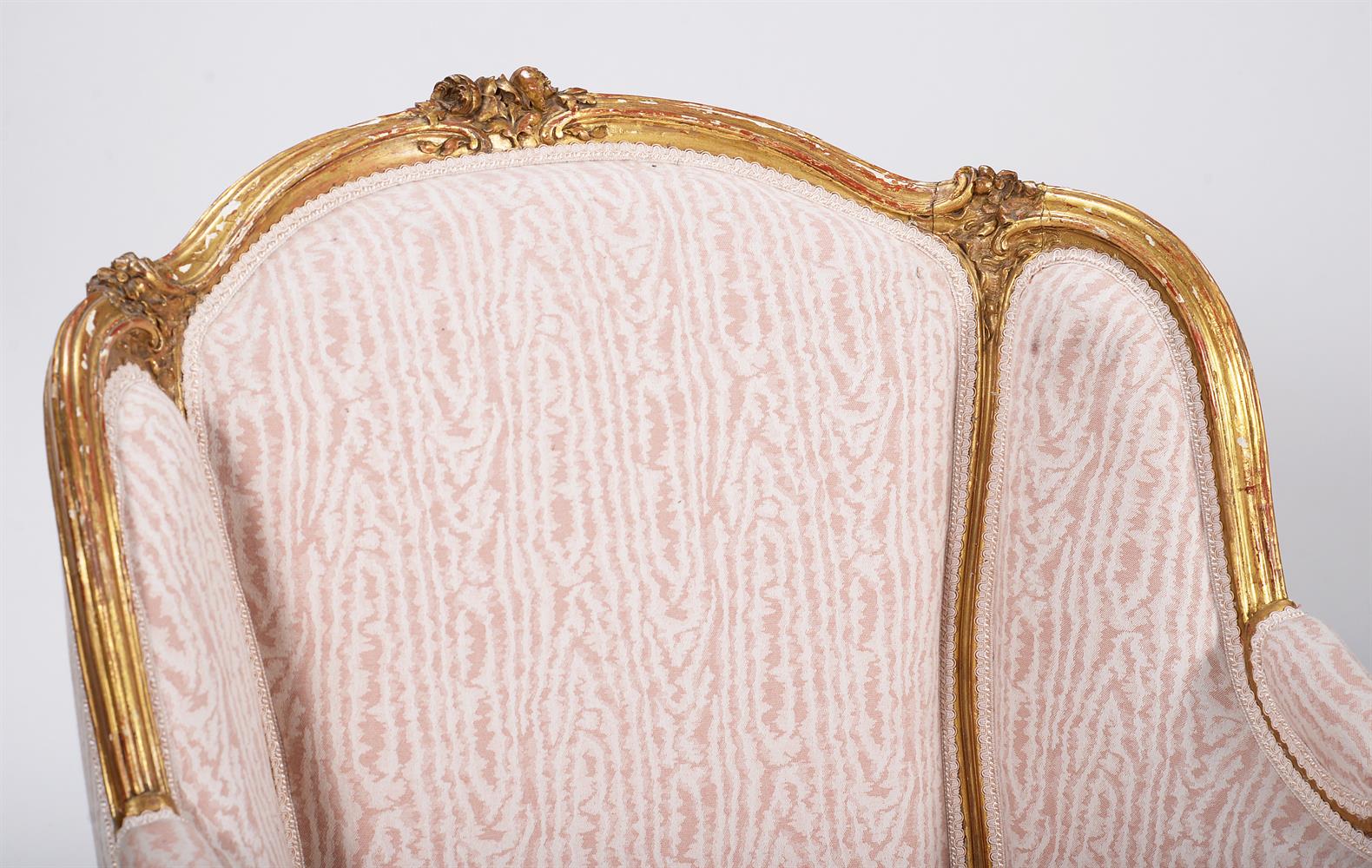 A PAIR OF CARVED GILTWOOD AND UPHOLSTERED BERGERE ARMCHAIRS, IN LOUIS XV STYLE, LATE 19TH CENTURY - Image 2 of 3