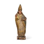 A CARVED AND POLYCHROME DECORATED FIGURE OF A BISHOP, PROBABLY SPANISH OR PORTUGUESE