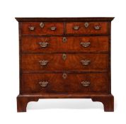 A QUEEN ANNE WALNUT, FIGURED WALNUT AND FEATHERBANDED CHEST OF DRAWERS, CIRCA 1710