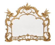 A CARVED GILTWOOD OVERMANTLE MIRROR, IN GEORGE III STYLE