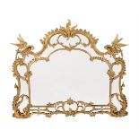 A CARVED GILTWOOD OVERMANTLE MIRROR, IN GEORGE III STYLE