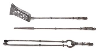 A SET OF THREE LION HANDLED POLISHED STEEL FIRE TOOLS, EARLY 19TH CENTURY