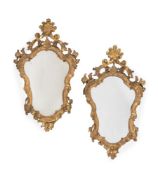 A PAIR OF ITALIAN CARVED GILTWOOD CARVED GILTWOOD WALL MIRRORS, MID 18TH CENTURY