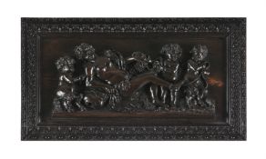 Y AFTER GÉRARD VAN OPSTAL (1605 - 1668)- A SET OF SIX CARVED MACASSAR EBONY PANELS