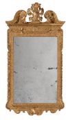 A GEORGE II GILTWOOD WALL MIRROR, IN THE MANNER OF WILLIAM KENT, CIRCA 1735