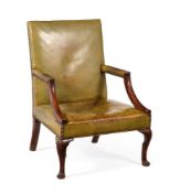 A GEORGE III MAHOGANY AND LEATHER UPHOLSTERED OPEN ARMCHAIR, CIRCA 1780