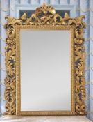 A SUBSTANTIAL GILTWOOD FLORENTINE OVERMANTLE MIRROR, LATE 19TH/EARLY 20TH CENTURY
