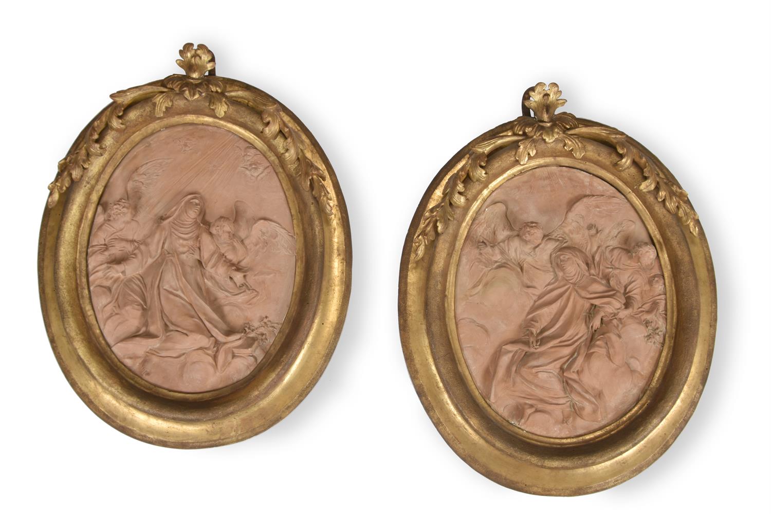 BRIELLO PIÒ (ITALIAN 1690-1770), A PAIR OF OVAL TERRACOTTA RELIEFS DEPICTING FEMALE SAINTS