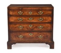 A GEORGE II BURR WALNUT CHEST OF DRAWERS, SECOND QUARTER 18TH CENTURY