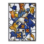 A JAMES I STAINED GLASS PANEL, EARLY 17TH CENTURY