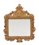 A CARVED GILTWOOD WALL MIRROR, LATE 17TH/EARLY 18TH CENTURY