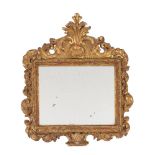 A CARVED GILTWOOD WALL MIRROR, LATE 17TH/EARLY 18TH CENTURY