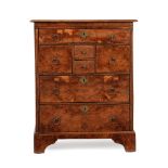 AN UNUSUAL WILLIAM III YEW WOOD AND OAK CHEST OF DRAWERS, CIRCA 1700