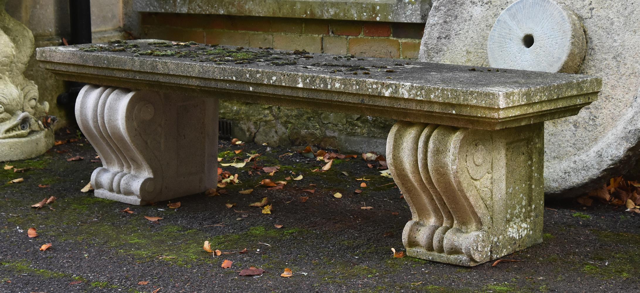 A COMPOSITION STONE BENCH, 20TH CENTURY