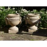 A PAIR OF TERRACOTTA URNS IN THE MANNER OF PULHAM, LATE 19TH CENTURY