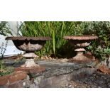 A PAIR OF VICTORIAN CAST IRON TERRACE URNS, IN THE MANNER OF THE HANDYSIDE FOUNDRY, 19TH CENTURY