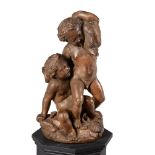 AN ITALIAN GILDED PLASTER CAST SCULPTURE OF TWO PUTTI FIGURES IN THE MANNER OF DOMENICO BRUCCIANI