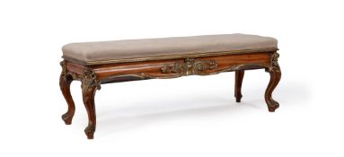 AN EARLY VICTORIAN WALNUT AND PARCEL GILT STOOL IN THE MANNER OF HOLLAND & SONS, CIRCA 1840