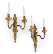 A PAIR OF FRENCH GILT BRONZE TWIN LIGHT WALL APPLIQUES, AFTER JEAN-CHARLES DELAFOSSE