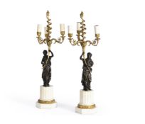 A PAIR OF FRENCH PARCEL GILT BRONZE AND MARBLE THREE LIGHT CANDELABRA, MID/EARLY 19TH CENTURY