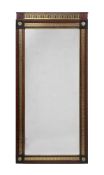 A RUSSIAN MAHOGANY AND BRASS MARQUETRY WALL MIRROR, CIRCA 1810