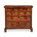 A GEORGE II WALNUT BACHELOR'S CHEST OF DRAWERS, CIRCA 1740