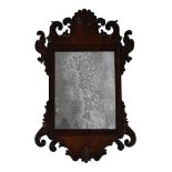 A GEORGE III MAHOGANY FRETWORK WALL MIRROR, THIRD QUARTER 18TH CENTURY