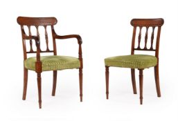A SET OF TWELVE REGENCY MAHOGANY DINING CHAIRS, IN THE MANNER OF GILLOWS, CIRCA 1820