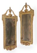 A PAIR OF NORTH ITALIAN GREEN PAINTED AND PARCEL GILT WALL MIRRORS, LATE 18TH CENTURY