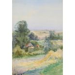 λ Henry John Sylvester Stannard (British 1870-1951), A cottage landscape