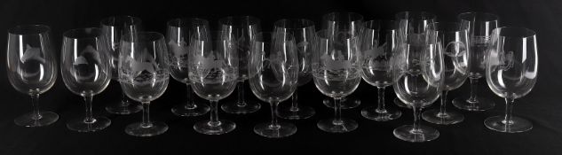 A suite of hand engraved large glass goblets relating to hunting