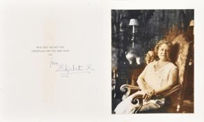 A pair of royal Christmas cards signed by Elizabeth the Queen Mother