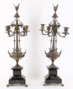 A pair of late 19th century ornate candlestick garnitures
