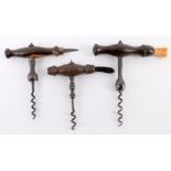 Three various 19th century hardwood handled straight pull corkscrews