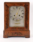 A mid-19th century French mahogany and box strung mantel clock