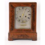 A mid-19th century French mahogany and box strung mantel clock