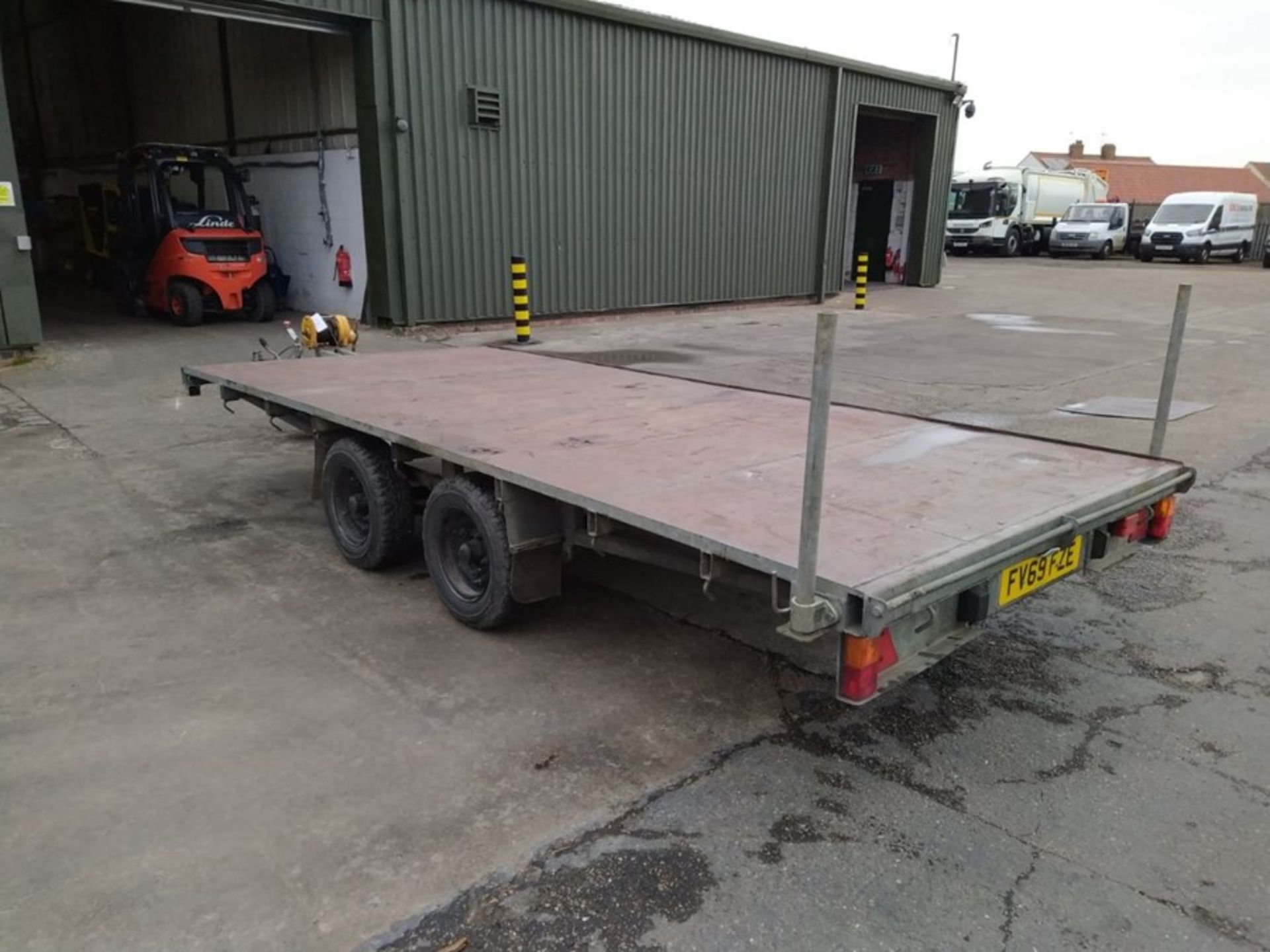 Double axle rough terrain 14 foot trailer with ramps and manual winch, very little used. RM Trailers - Image 2 of 6