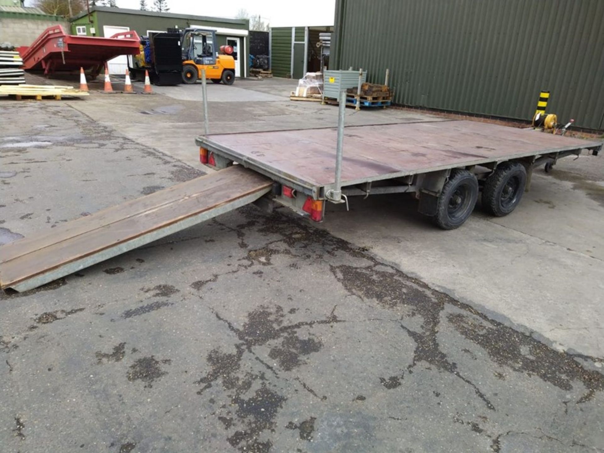 Double axle rough terrain 14 foot trailer with ramps and manual winch, very little used. RM Trailers - Image 3 of 6