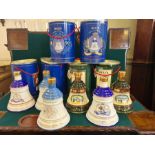 6 x unopened commemorative Bells Scotch Whisky decanters in original decorative tubes to include
