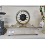 French white marble mantle clock, circular cased movement on scrolled shoulders on a rectanuglar