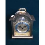 Swiss made Swiza 15 jewel 8 day brass carriage alarm clock.