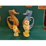 A pair of glazed pottery seahorse jugs, Royal Doulton Whyte & Mackay barn owl and a Beswick owl.