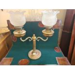 Large twin burner candelabra oil lamp with embossed and flared shades.